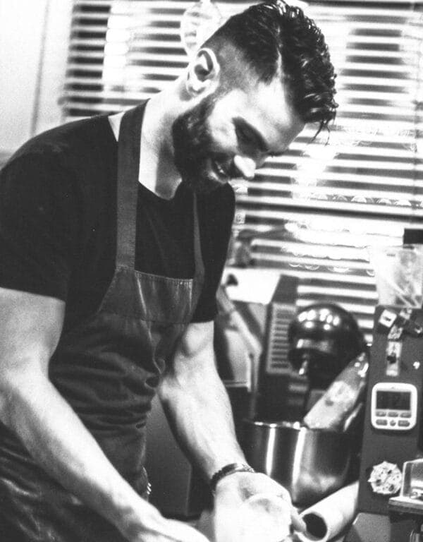 Daniel Mellicovsky baking in the kitchen